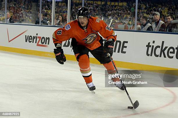 Temmu Selanne of the Anaheim Ducks skates with the puck against the Los Angeles Kings during the 2014 Coors Light NHL Stadium Series at Dodger...