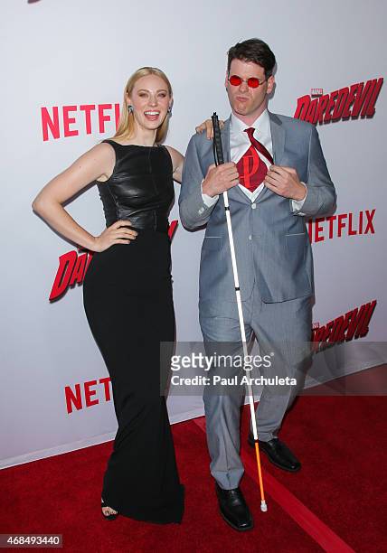Actress Deborah Ann Woll and E.J. Scott attend the premiere of "Marvel's Daredevil" at Regal Cinemas L.A. Live on April 2, 2015 in Los Angeles,...