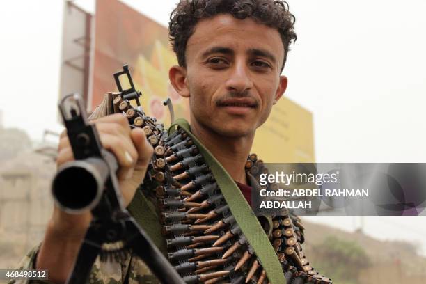 Supporter of the Shiite Huthi militia attends a demonstration in Yemen's second larget city of Taez on April 3 to protest against the Saudi-led...