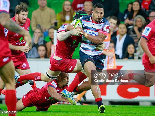 Sefanaia Naivalu of the Rebels runs with the ball during the round eight Super Rugby match between the Rebels and the Reds at AAMI Park on April 3,...