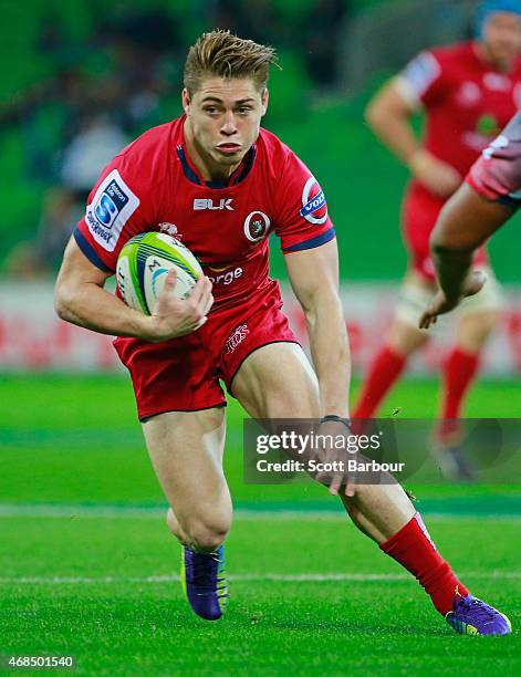 James OConnor of the Reds runs with the ball during the round eight Super Rugby match between the Rebels and the Reds at AAMI Park on April 3, 2015...