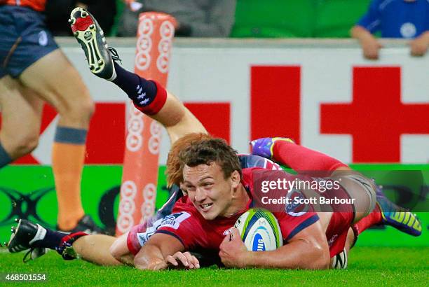 Jake Schatz of the Reds scores a try during the round eight Super Rugby match between the Rebels and the Reds at AAMI Park on April 3, 2015 in...