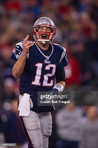 Quarterback Tom Brady of the New England Patriots calling signals during the AFC Divisional Playoff against the Houston Texans at Gillette Stadium on...