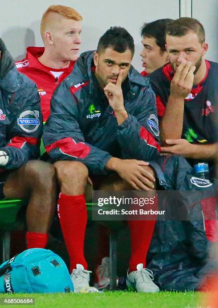 Karmichael Hunt of the Reds looks on from the bench during the round eight Super Rugby match between the Rebels and the Reds at AAMI Park on April 3,...