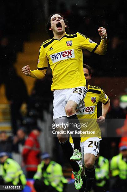 Jota of Brentford celebrates scoring his sides fourth goal during the Sky Bet Championship match between Fulham and Brentford at Craven Cottage on...