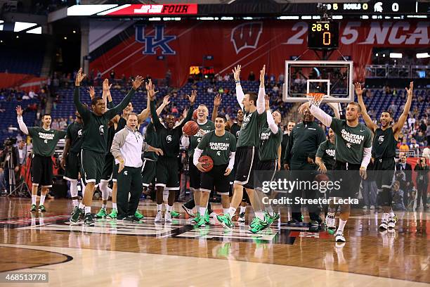 Head coach Tom Izzo of the Michigan State Spartans and his team react during practice for the NCAA Men's Final Four at Lucas Oil Stadium on April 3,...