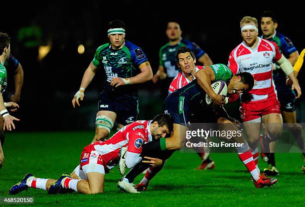 Connacht full back Mils Muliaina is stopped by Jonny May and James Hook of Gloucester during the European Rugby Challenge Cup Quarter Final match...