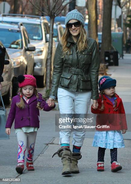 Sarah Jessica Parker is seen with her twin daughters Marion Loretta Elwell Broderick and Tabitha Hodge Broderick on March 13, 2013 in New York City.