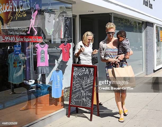 Charlize Theron is seen with her son Jackson Theron and mother Gerda Maritz on March 02, 2013 in Los Angeles, California.