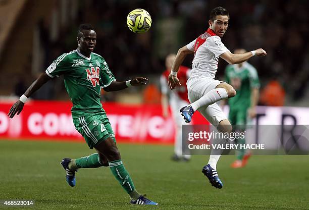 Monaco's Portuguese midfielder Joao Moutinho vies with St Etienne's Ivorian midfielder Ismael Diomande during the French L1 football match Monaco and...