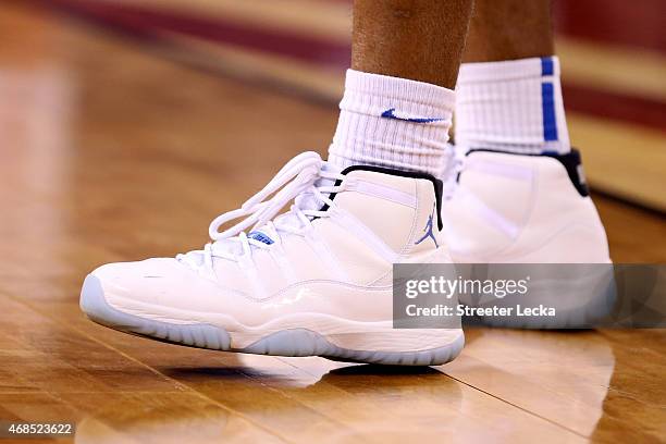 Detail view of sneakers worn by Aaron Harrison of the Kentucky Wildcats are seen during practice for the NCAA Men's Final Four at Lucas Oil Stadium...