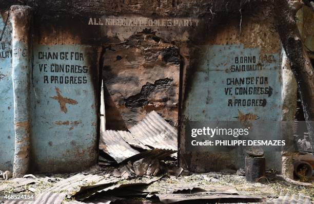 Burnt out shop is seen on April 3, 2015 in Malam Fatori, in northeastern Nigeria, which was retaken from Islamist Boko Haram militants by troops from...