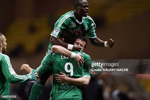 St Etienne's French forward Mevlut Erding celebrates with teammates after scoring a goal during the French L1 football match Monaco and Saint Etienne...