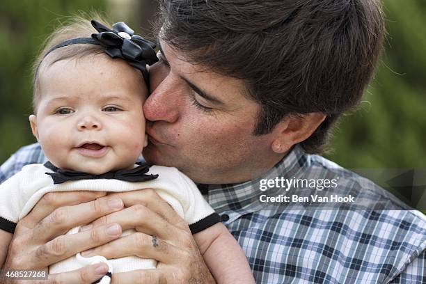 Masters Preview: Closeup portrait of Bubba Watson with his daughter Dakota during photo shoot at Isleworth G&CC. Windermere, FL 3/16/2015 CREDIT: Ben...