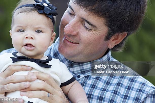 Masters Preview: Closeup portrait of Bubba Watson with his daughter Dakota during photo shoot at Isleworth G&CC. Windermere, FL 3/16/2015 CREDIT: Ben...