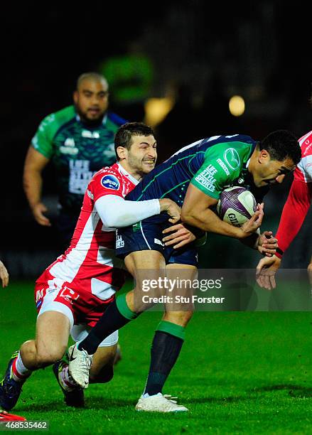 Connacht full back Mils Muliaina is stopped by Jonny May of Gloucester during the European Rugby Challenge Cup Quarter Final match between Gloucester...