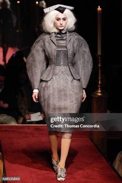 Model walks the runway at Thom Browne Women's during Mercedes-Benz Fashion Week Fall 2014>> at Center 548 on February 10, 2014 in New York City.