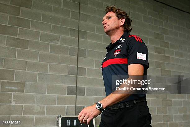 Bombers coach James Hird walks onto the field prior the Round One AFL match between the Sydney Swans and the Essendon Bombers at ANZ Stadium on April...