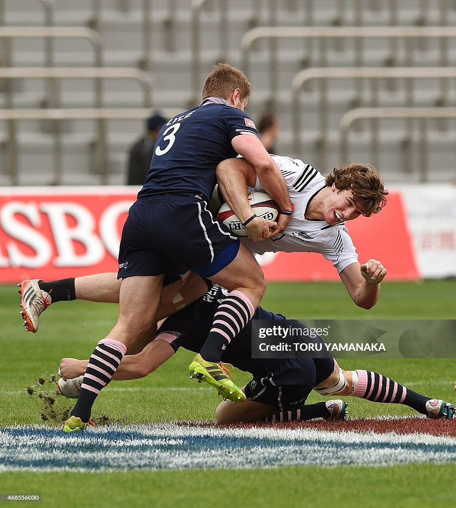 Sam Dickson Rugby New Zealand's Sam Dickson is tackled by Scotland's Fraser Lyle and ...