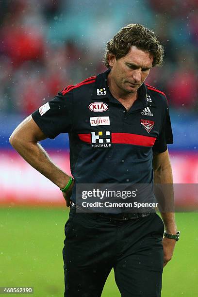 Bombers coach James Hird looks dejected after losing the Round One AFL match between the Sydney Swans and the Essendon Bombers at ANZ Stadium on...