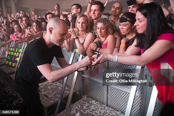 Jono Grant meets fans as Above and Beyond perform on stage during the first of two sold out nights at Brixton Academy on April 3, 2015 in London,...