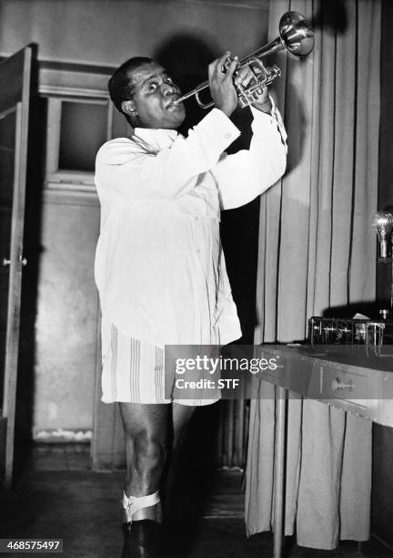 Picture taken 26 October 1949 in Milan shows American Louis Armstrong, the jazz trumpeter whose melodic inventiveness established the central role of...