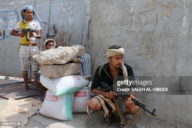 Armed Yemeni supporters of the separatist Southern Movement hold a position on April 4, 2015 at the northern entrance of the southern Yemeni port...