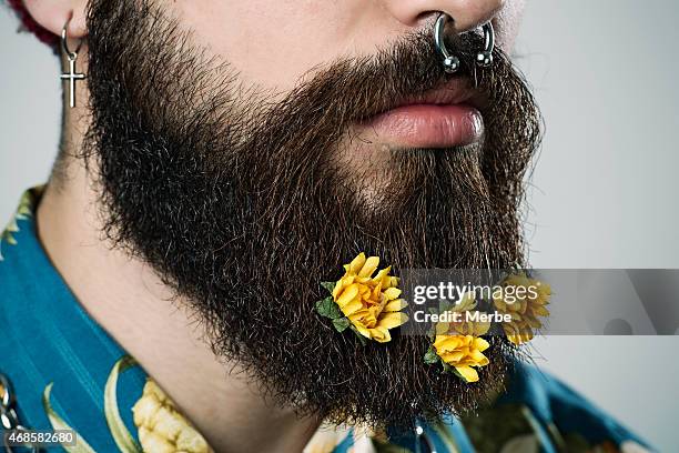 bart mit blumen - hispanic man profile hopeful stock-fotos und bilder