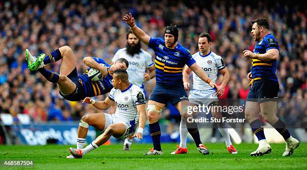 Bath player Anthony Watson puts in a late challenge on Rob Kearney of Leinster and is yellow carded during the European Rugby Champions Cup Quarter...