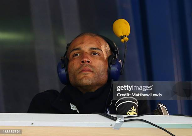 Former footballer Clarke Carlisle looks on during the Barclays Premier league match West Bromwich Albion and Queens Park Rangers at The Hawthorns on...