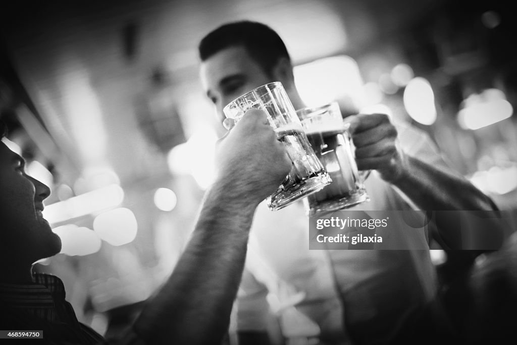 Guys having beer.