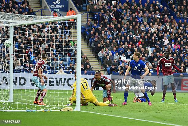 Andy King of Leicester City scores their second goal during the Barclays Premier league match Leicester City and West Ham United at The King Power...