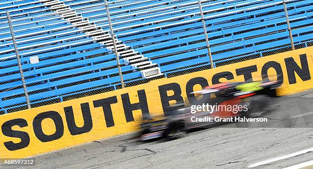 Jason Myers, driver of the Adams Towing & Recovery Ford, turns a lap during a practice session for the Easter Bunny NASCAR Whelen Southern Modified...