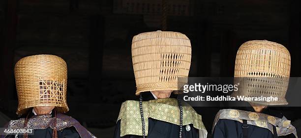 Japanese Shakuhachi players perform traditional bamboo flutes during the Oni Oi annual festival at Masuiyama Zuiganji Temple on February 11, 2104 in...