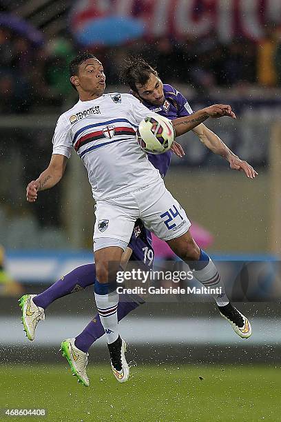 Milan Badelj of ACF Fiorentina battles for the ball with Luis Muriel of UC Sampdoria during the Serie A match between ACF Fiorentina and UC Sampdoria...