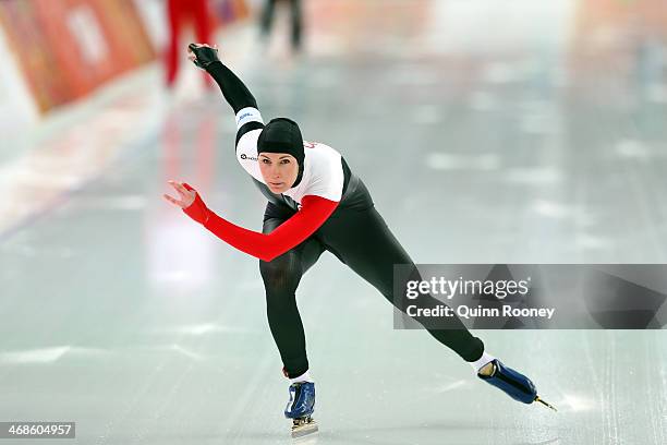 Anastasia Bucsis of Canada competes during the Women's 500m Race 1 of 2 Speed Skating event during day 4 of the Sochi 2014 Winter Olympics at Adler...