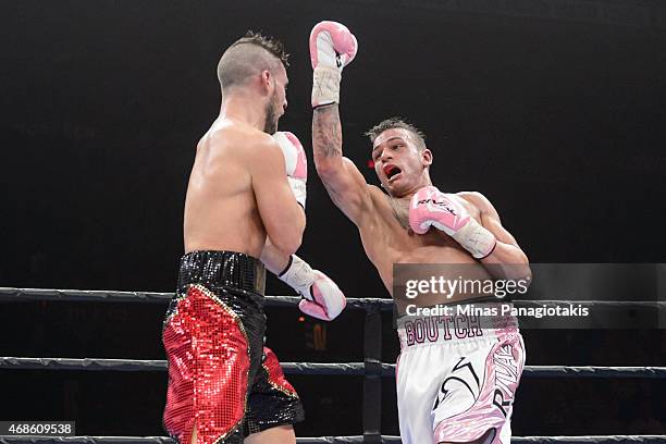 Sebastien Bouchard misses with an uppercut against Denis Farias during the super welterweight bout at Pepsi Coliseum on April 4, 2015 in Quebec City,...