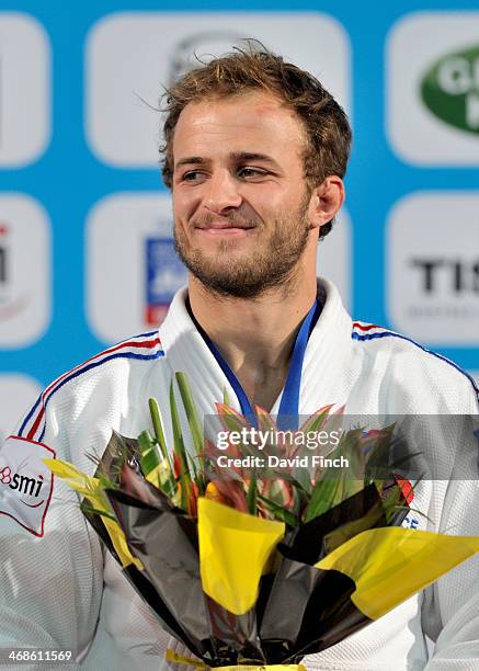 Ugo Legrand of France smiles after receiving his u73kg bronze medal during the Paris Grand Slam on Saturday, February 08, 2014 at the Palais...