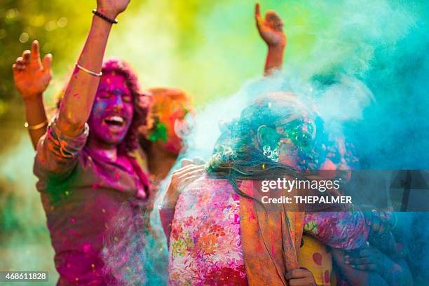 celebrating holi festival in india - holi festival and indian person stock pictures, royalty-free photos & images