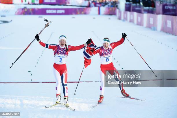 Maiken Caspersen Falla of Norway and Ingvild Flugstad Oestberg of Norway celebrate winning first and second place in the Finals of the Ladies' Sprint...