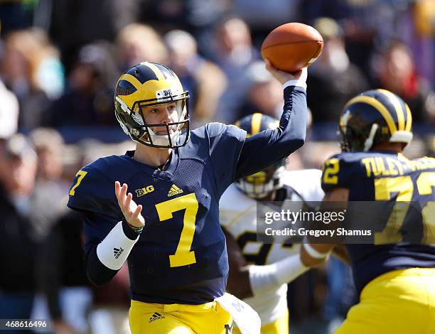 Shane Morris of the Michigan Wolverines throws a pass during the Michigan Football Spring Game on April 4, 2015 at Michigan Stadium in Ann Arbor,...