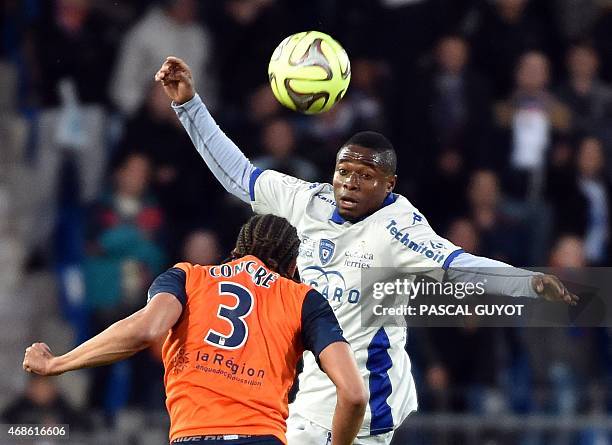 Montpellier's French defender Daniel Congre vies with Bastia's Guinean forward Francois Kamano during the French L1 football match between...