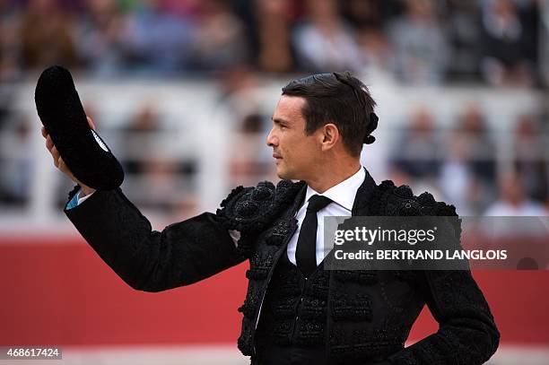 Spanish matador Jose Maria Manzanares acknowledges the audience to his late father prior to fighting a Domingo Hernandez bull during the Easter feria...