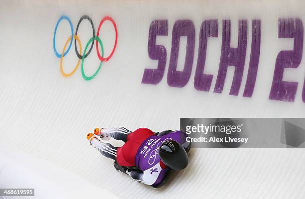 Tomass Dukurs of Latvia makes a run during a Men's Skeleton training session on Day 4 of the Sochi 2014 Winter Olympics at the Sanki Sliding Center...