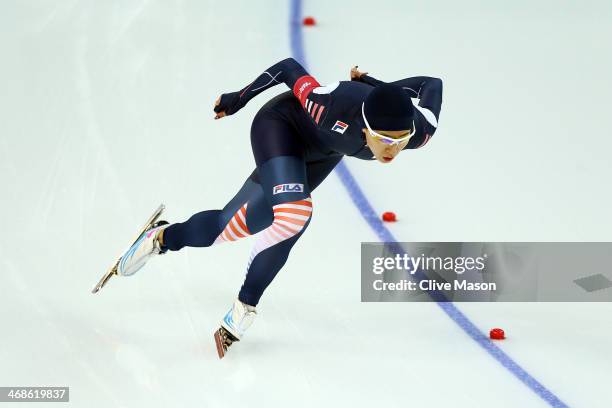 Sang Hwa Lee of South Korea competes during the Women's 500m Race 1 of 2 Speed Skating event during day 4 of the Sochi 2014 Winter Olympics at Adler...