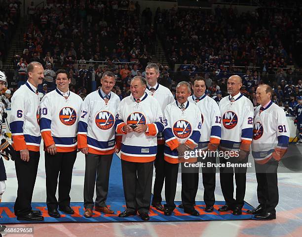 The New York Islanders celebrate Decades Night as Ken Morrow, Steve Webb, Pierre Turgeon, Ed Westall, Eric Cairns, Garry Howatt, Shawn Bates, Bobby...