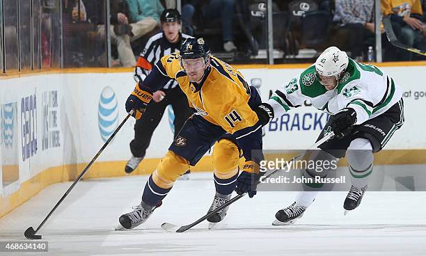 Mattias Ekholm of the Nashville Predators skates against Ales Hemsky of the Dallas Stars during an NHL game at Bridgestone Arena on April 4, 2015 in...