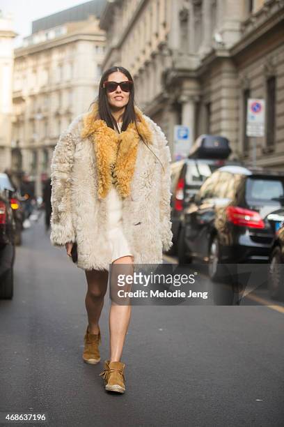 Grazia IT girl Gilda Ambrosio wears a Prada, Balenciaga, Marcolin eyewear, and Saint Laurent Paris shoes on Day 5 of Milan Fashion Week FW15 on March...