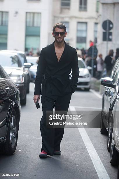 La Republicca editor Simone Marchetti wears a Sportmax outfit on Day 5 of Milan Fashion Week FW15 on March 1, 2015 in Milan, Italy.