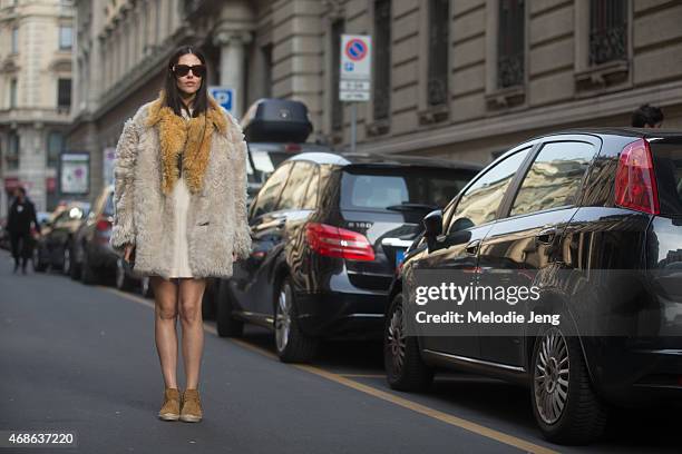 Grazia IT girl Gilda Ambrosio wears a Prada, Balenciaga, Marcolin eyewear, and Saint Laurent Paris shoes on Day 5 of Milan Fashion Week FW15 on March...